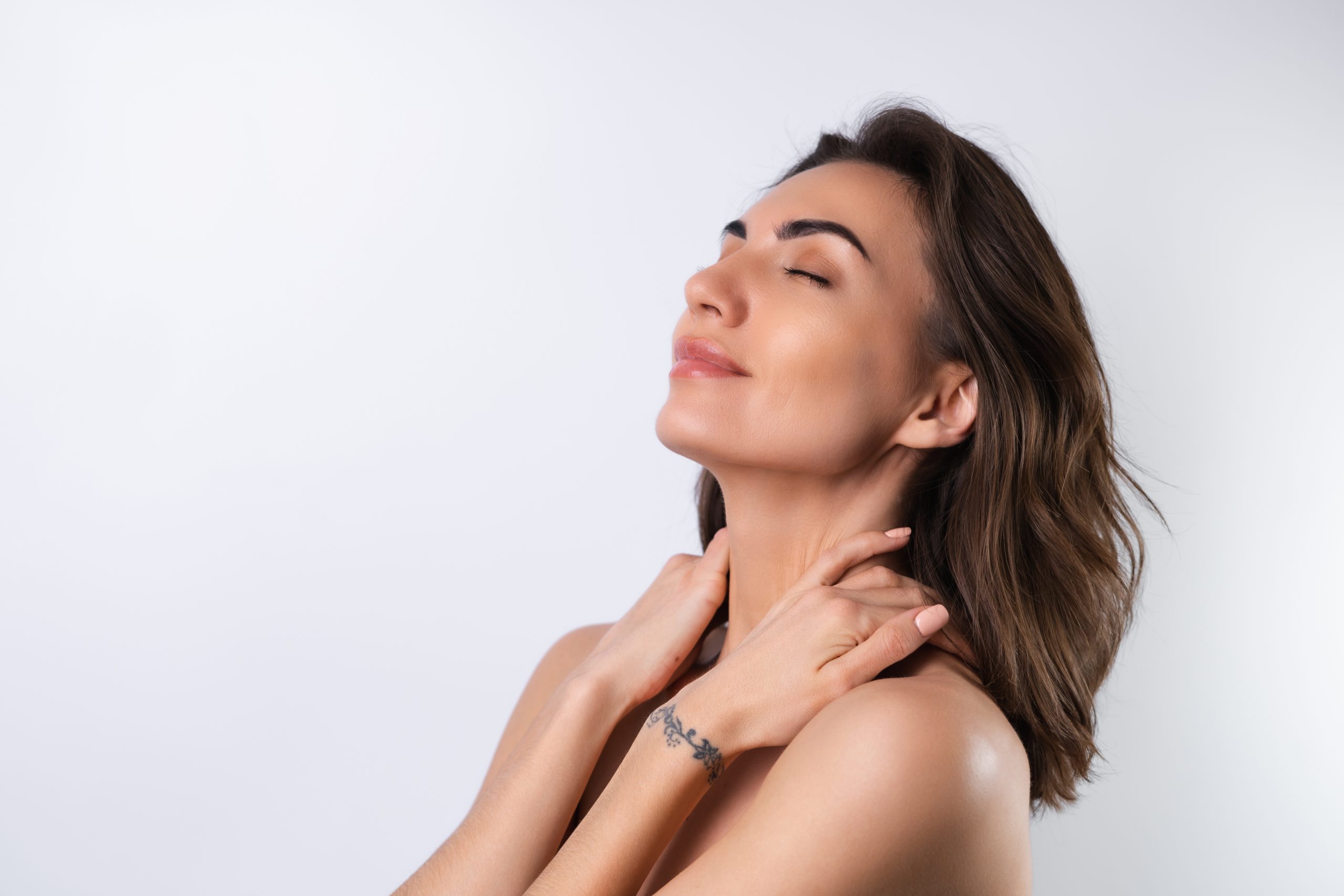 closeup beauty portrait topless woman with perfect skin natural makeup